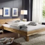 SAM® Massiv-Holzbett Columbia in Wildeiche, Bett mit geschlossenem Kopfteil, natürliche Maserung, massive widerstandsfähige Oberfläche in zeitlosem Naturton, 100 x 200 cm